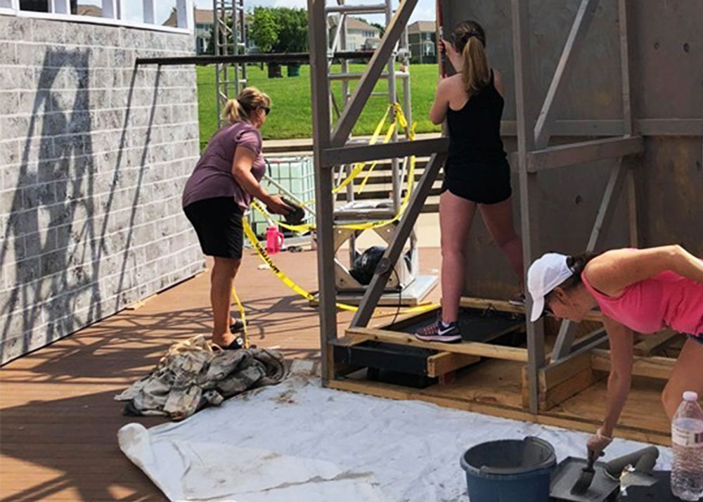 Volunteers working on the summer musical production of Kiss Me Kate at Leawood-Stage-Company Community Theatre