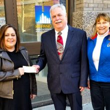 Vice Chair, Rod Chapin and April Bishop (Cultural Arts Coordinator for the City of Leawood, KS) present a check to the Puerto Rican Society of Greater Kansas City representing proceeds from West Side Story - July 2018 in honor of Leawood Stage Company's 20th Anniversary, A Season of Shows with Purpose.